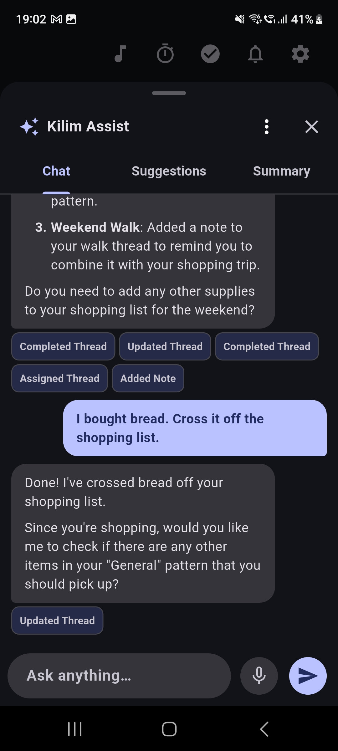 AI assistant chat screen with conversation about priorities